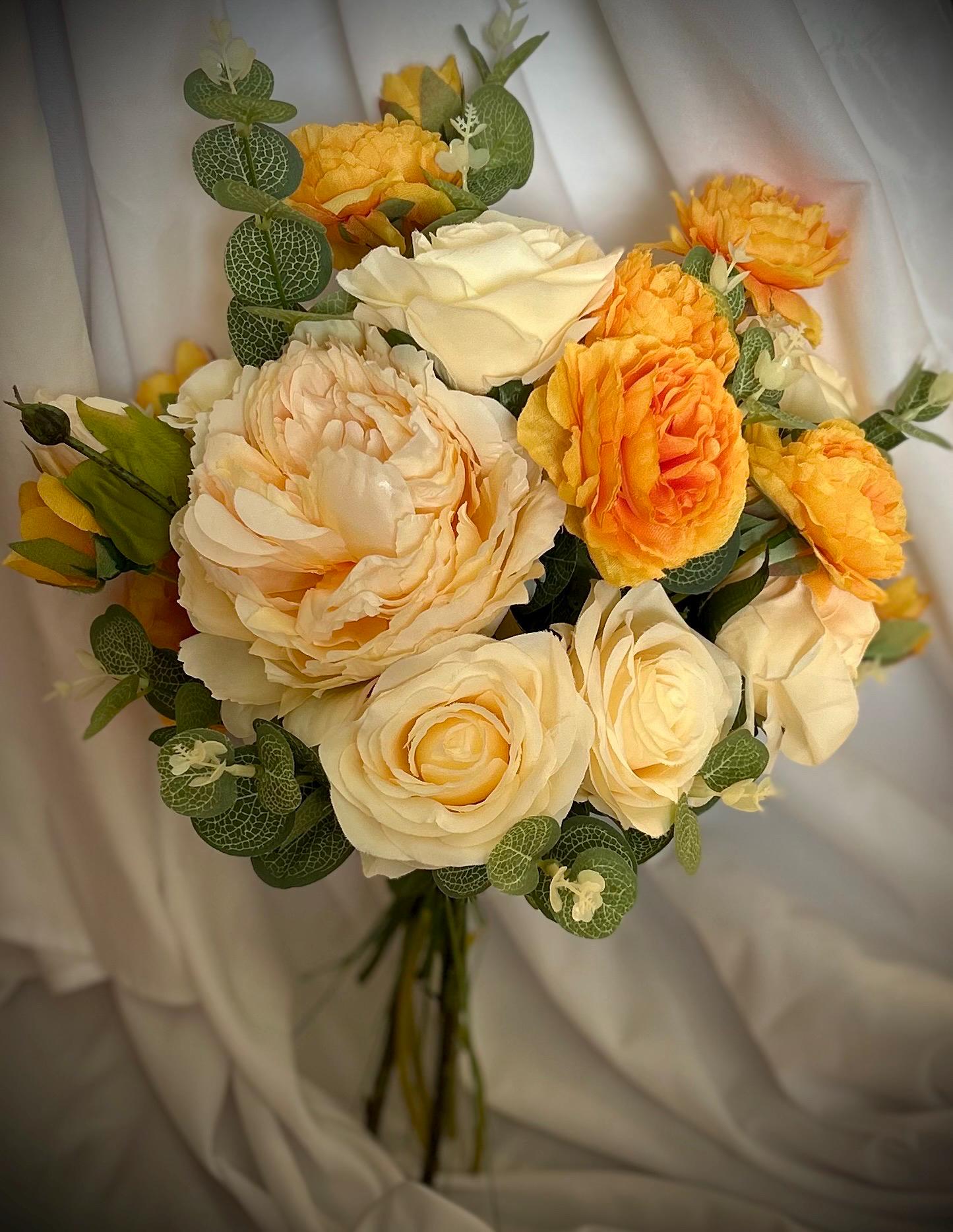 Ivory and golden orange bridal bouquet